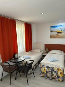 Posteľ alebo postele v izbe v ubytovaní Stilo Hotel