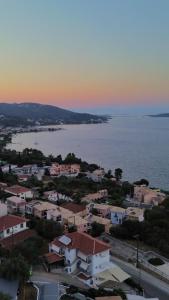 an aerial view of a city and the water at Casa di Giorgio in Nikiana
