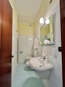 Koupelna v ubytování Hotel Praja
