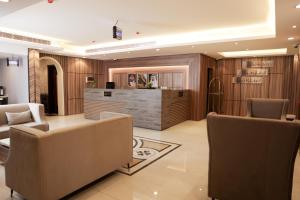 Posezení v ubytování Buyot Malath Serviced Apartment - شقق بيوت ملاذ للشقق المخدومة