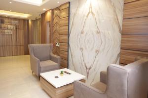 Posezení v ubytování Buyot Malath Serviced Apartment - شقق بيوت ملاذ للشقق المخدومة
