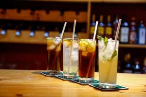 a group of four drinks sitting on a table at Hotel Resort Thiago in Chincha Alta