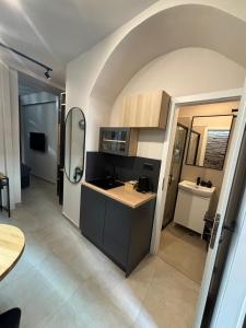 a kitchen with a sink and a counter top at City room Zagreb in Zagreb +12 photos