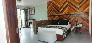 Voodi või voodid majutusasutuse Yellow Tree Suites toas