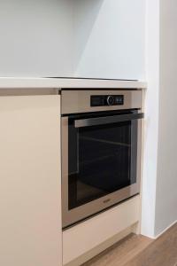 Nhà bếp/bếp nhỏ tại 59 Bleu H City Center Apart with FreeParking, AC, and an extra large comfy bed