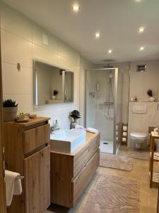 Kúpeľňa v ubytovaní Appartement Emilia + 37 fotografií