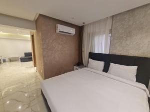 Voodi või voodid majutusasutuse El Mesaadya Hotel فندق المساعدية toas