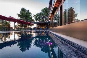 Bazén v ubytování Casa Mimas Hotel nebo v jeho okolí