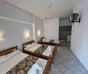 Postel nebo postele na pokoji v ubytování Hotel Katia