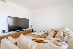 TV a/nebo společenská místnost v ubytování Design Wohnung mit viel Luxus