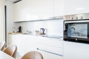 Kuchyň nebo kuchyňský kout v ubytování Design Wohnung mit viel Luxus
