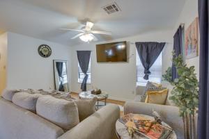 a living room with couches and a ceiling fan at Less Than 3 Mi to French Quarter Pet-Friendly Home in New Orleans