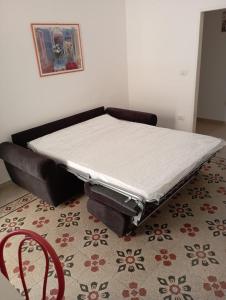 - un lit avec matelas dans l'établissement Al Quindici, à Gaète 6 autres photos