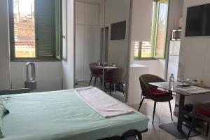 Postel nebo postele na pokoji v ubytování Studio Clim Monte Carlo