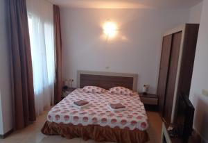 Postel nebo postele na pokoji v ubytování Студио Море