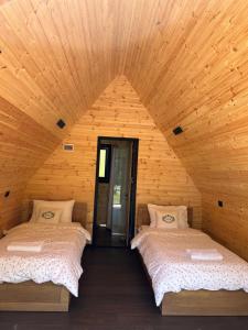 Postel nebo postele na pokoji v ubytování VITA Guesthouse