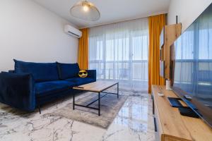 Posezení v ubytování Lauta Forest 1-bedroom apartment