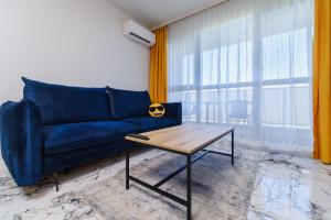 Posezení v ubytování Lauta Forest 1-bedroom apartment