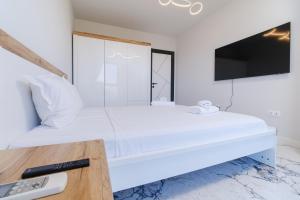 Postel nebo postele na pokoji v ubytování Lauta Forest 1-bedroom apartment
