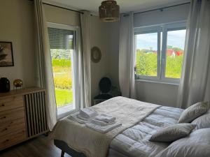 Postel nebo postele na pokoji v ubytování Baltic Gem