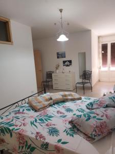 Postel nebo postele na pokoji v ubytování Taverna li Rizzi