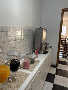 Kuchyň nebo kuchyňský kout v ubytování Hotel São Luis
