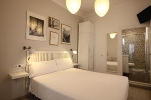 Posteľ alebo postele v izbe v ubytovaní Las Atarazanas - Design Hostal