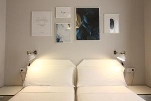 Posteľ alebo postele v izbe v ubytovaní Las Atarazanas - Design Hostal