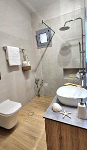 Koupelna v ubytování Aeraki Luxury Apartment