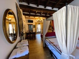 Posteľ alebo postele v izbe v ubytovaní La Torre del Vicario