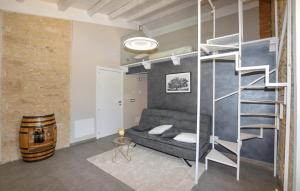 a living room with a bunk bed and a ladder at Tenuta Flaccavento in Chiaramonte Gulfi