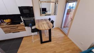 Η κουζίνα ή μικρή κουζίνα στο Charmant Appartement Cosy Calme +4 φωτογραφίες