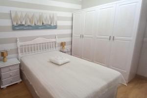 Postel nebo postele na pokoji v ubytování Casa Aurora