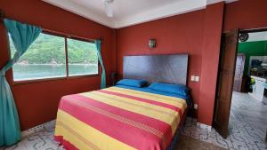 Postel nebo postele na pokoji v ubytování Villas Santa Cecilia Villa Velyn en Yelapa