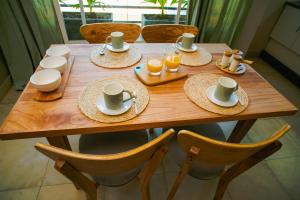 Uru Apart Iguazu餐厅或其他用餐的地方