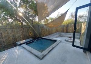 Bazén v ubytování House Motswiri nebo v jeho okolí