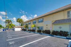 a parking lot in front of a hotel at Waves 8 in St Pete Beach