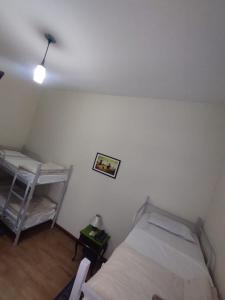Postel nebo postele na pokoji v ubytování Hotel Cervantes