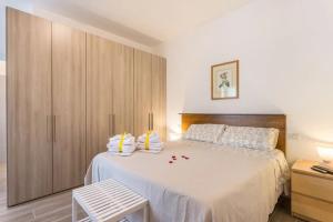 Postel nebo postele na pokoji v ubytování CASA DI LUX E MAX - SUB 701
