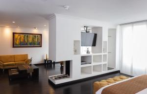 TV a/nebo společenská místnost v ubytování Hotel Varuna