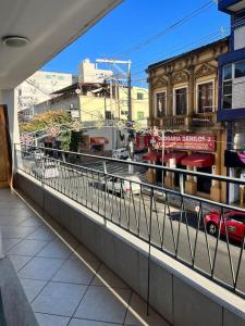 a view of a city street from a balcony at Apartamento Centro SerraNegra in Serra Negra