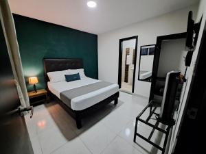 Postel nebo postele na pokoji v ubytování Hotel 9-25