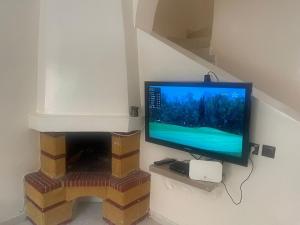 TV a/nebo společenská místnost v ubytování Duplex avec piscine - Sidi Bouzid