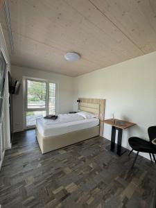 Postelja oz. postelje v sobi nastanitve Hotel Lijo, bei Basel