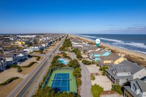 an aerial view of a beach with houses and a tennis court at SP8B Sea Pointe 8B in Nags Head