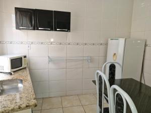 Kuchyň nebo kuchyňský kout v ubytování Lofts encantus