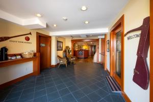 a hallway of a hospital with a waiting room at Sidney Waterfront Inn & Suites in Sidney