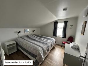 Voodi või voodid majutusasutuse Guesthouse Básar toas