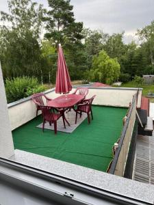 Bazén v ubytování Ferienwohnung Seeblick am Muldestausee nebo v jeho okolí