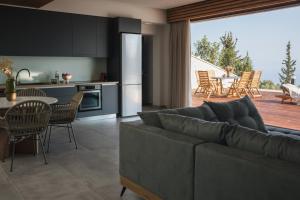 Kuchyň nebo kuchyňský kout v ubytování Petroto Sea View Villas
